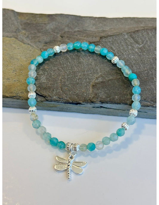 PULSERA BAÑADA EN PLATA CRISTALES CELESTE - Mi tienda en línea
