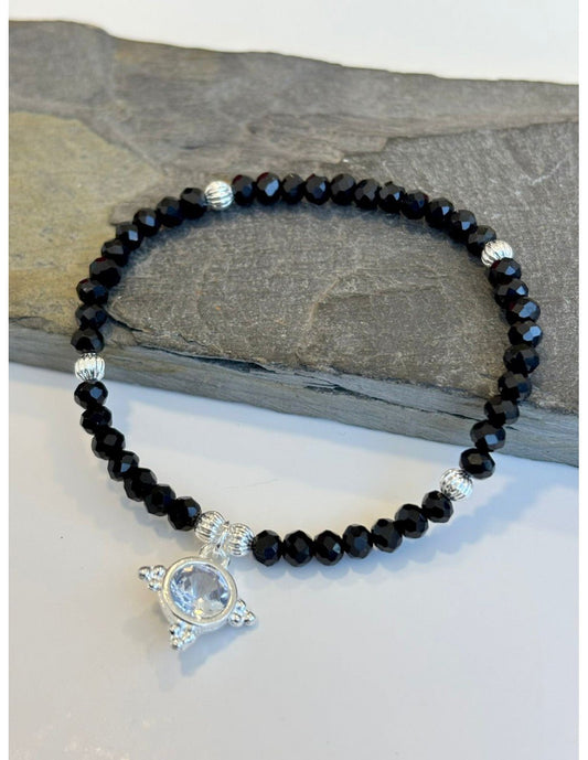 PULSERA ELASTICADA BAÑADA EN PLATA CRISTALES NEGROS - Mi tienda en línea